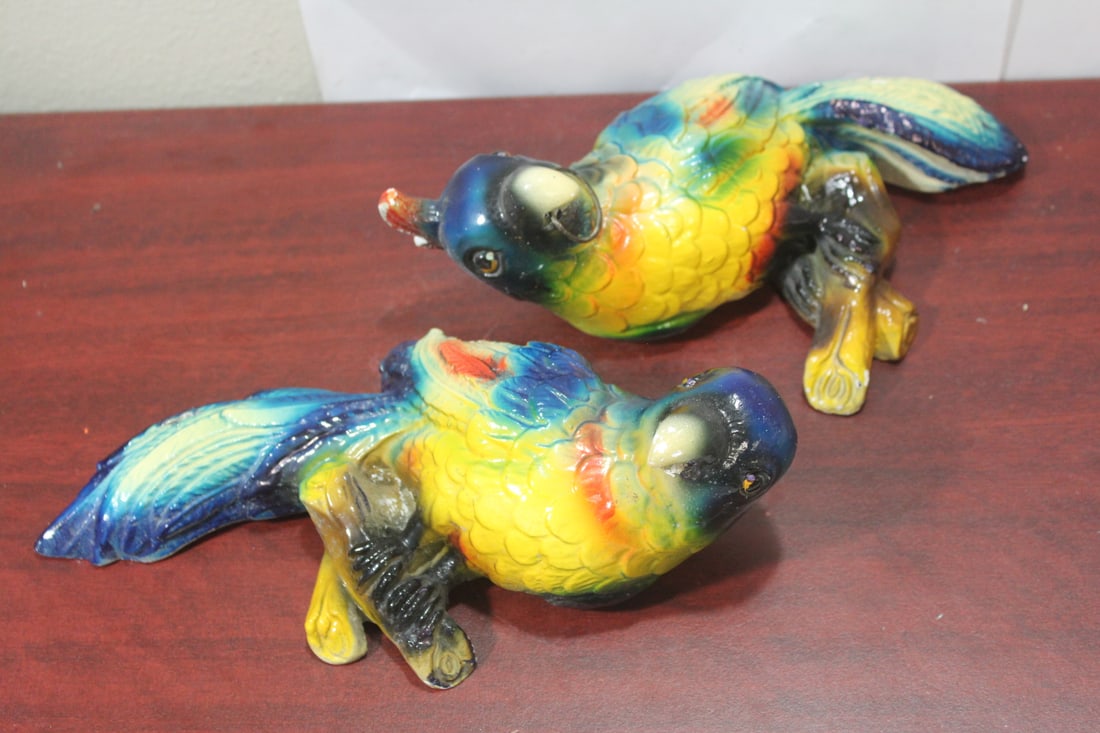 A Pair of Ceramic or Chalk Parrots: please note: minor losses as shown - both are wall hangers - 10 3/8" across