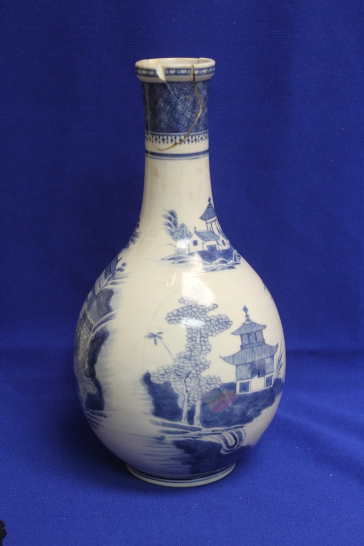 AN Antique Chinese Blue and White Bottle: 19th century - please note: as found (restored, crack, hairlines thourghout) - 10" tall