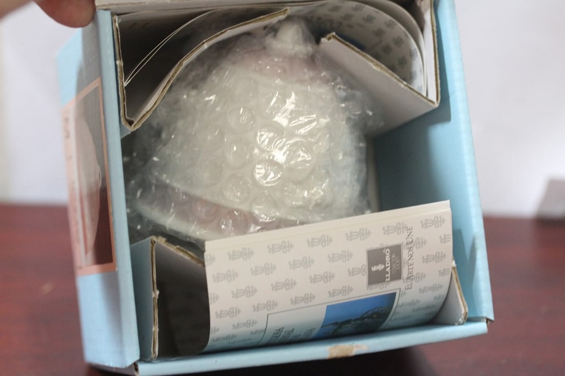 A Lladro Bell - 1987: 3" tall