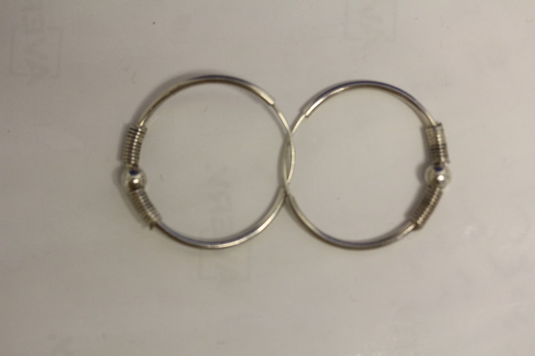 Pair of Sterling Hoop Earrings: unusual design