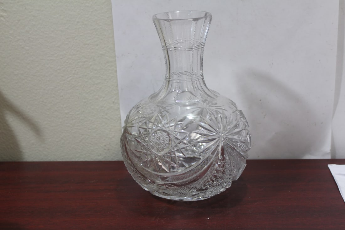 A Brilliant Cut Glass Bottle: please note: some wear - 8 1/4" tall