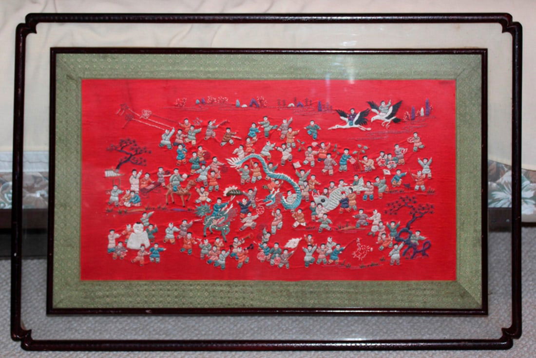 Antique Chinese Early 20th Century Embroidery: "Hundred Children" Sight size 30" x 18". Unusually framed 36" x 23".