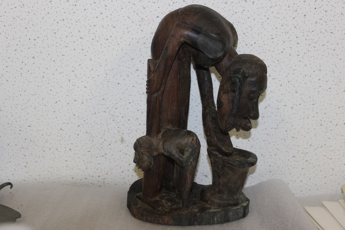 A Vintage Exotic Wood African Statue: 12 inches tall
