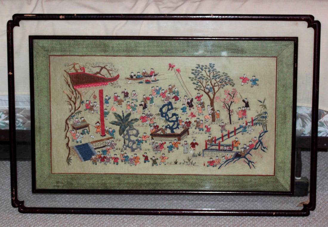 Antique Chinese Early 20th Century Embroidery: "Hundred Children" Sight size 30" x 18". Unusually framed 36" x 23".