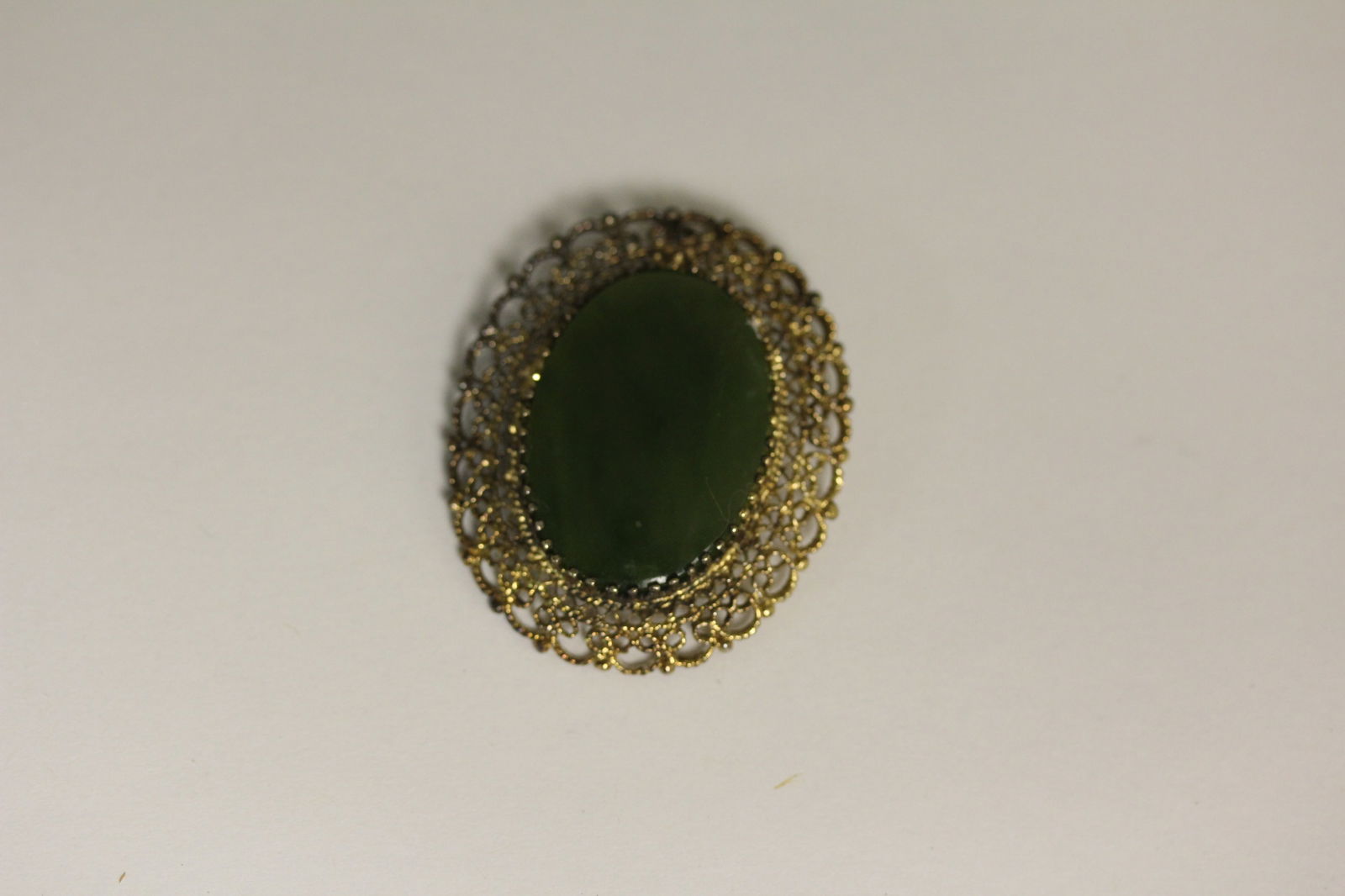 A Jade and Sterling Brooch: as shown - marked