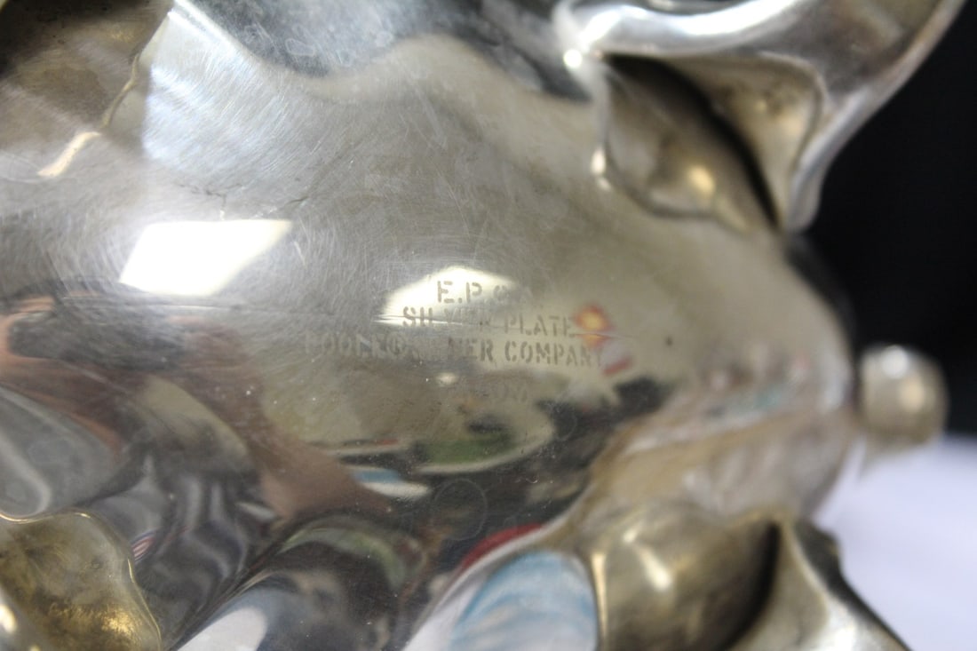 A Silverplated Teapot - 12