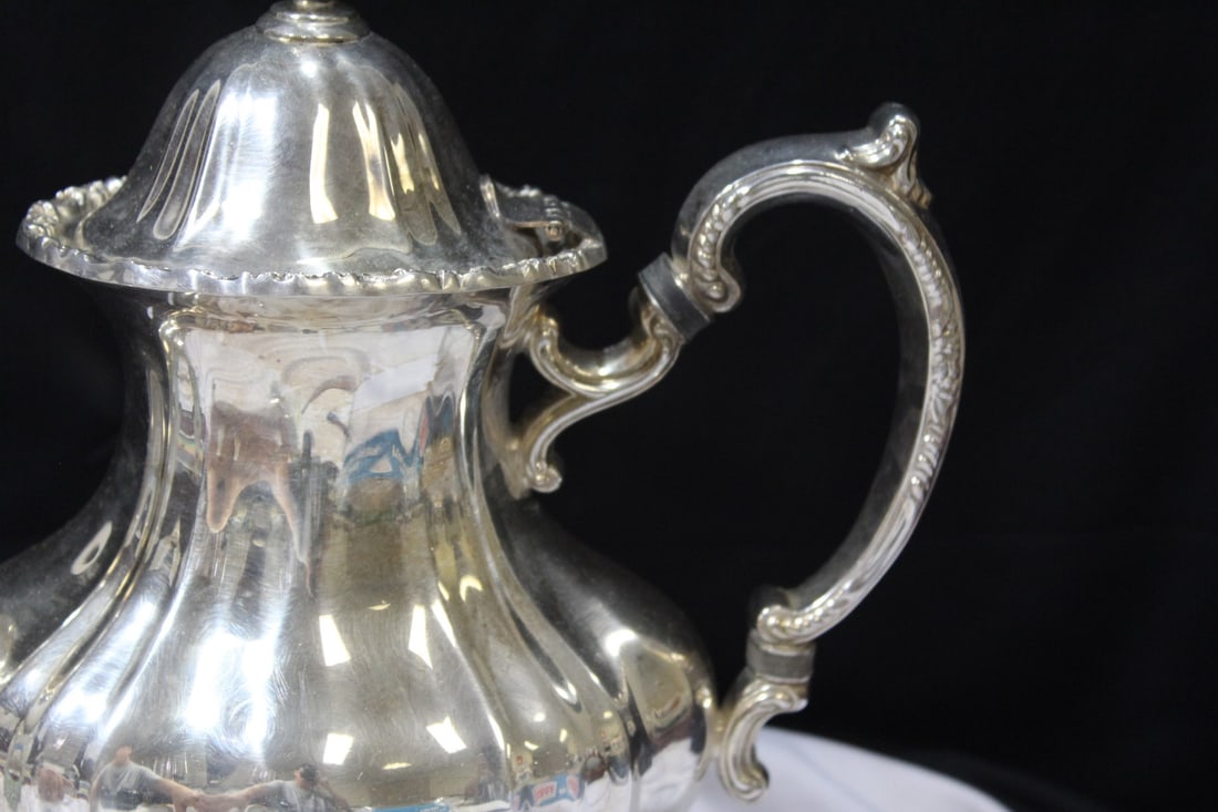 A Silverplated Teapot - 5