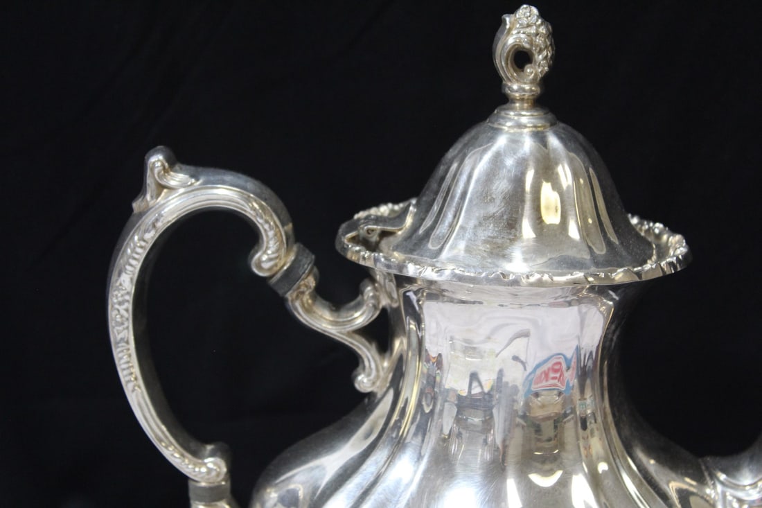 A Silverplated Teapot - 9