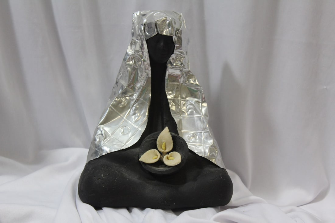An Artist Signed St. Mary Figure: artist: Laura Rodriguez Aviles - tin foil and pottery/clay - 7 3/4" tall
