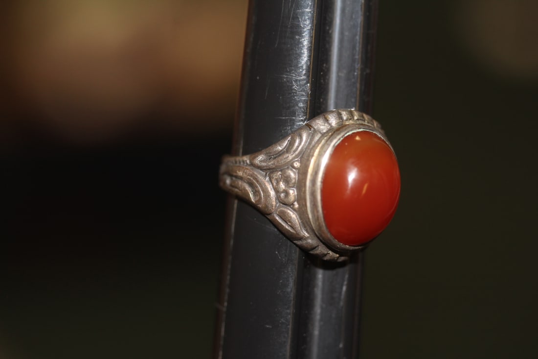 Antique Marked Silver Ring: marked 835 silver ring - well carved - stone is possibly carnelian jade