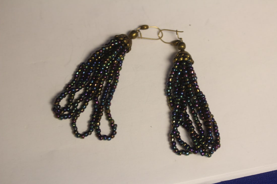 A Pair of Costume Earrings: as shown