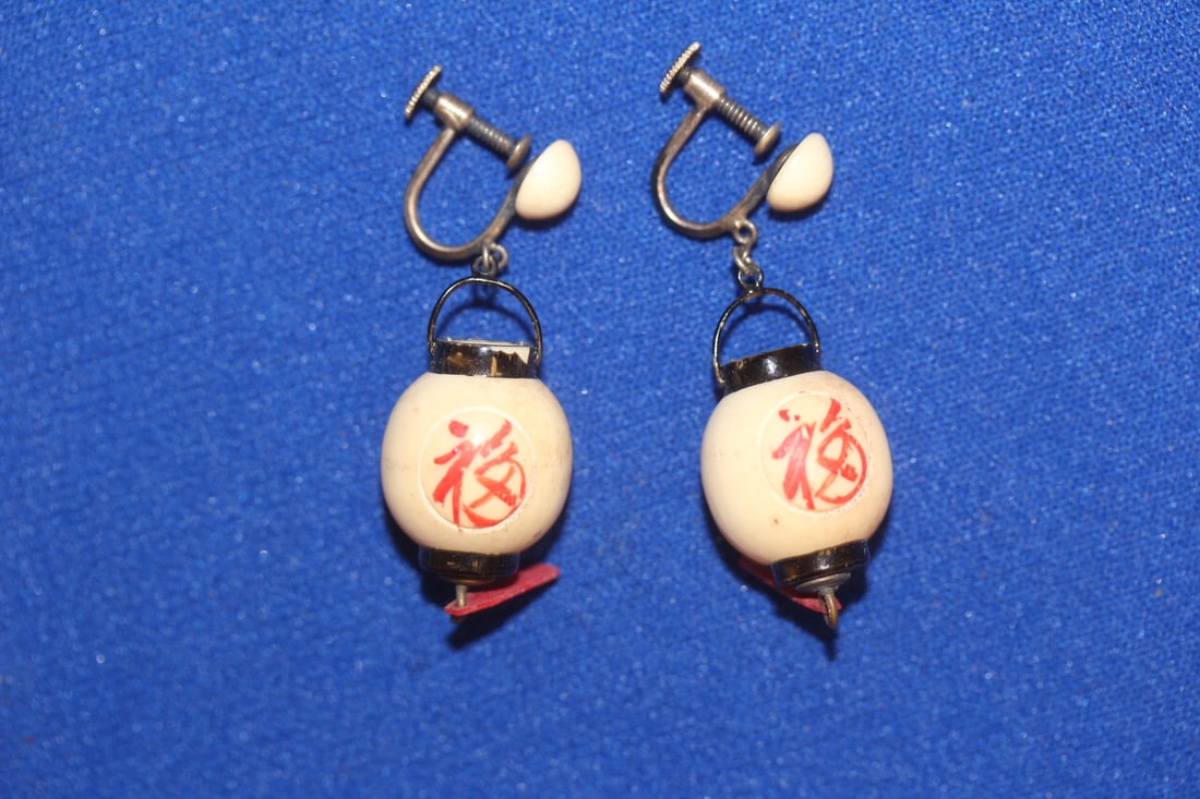 A Pair of Chinese Bone Earrings: as shown