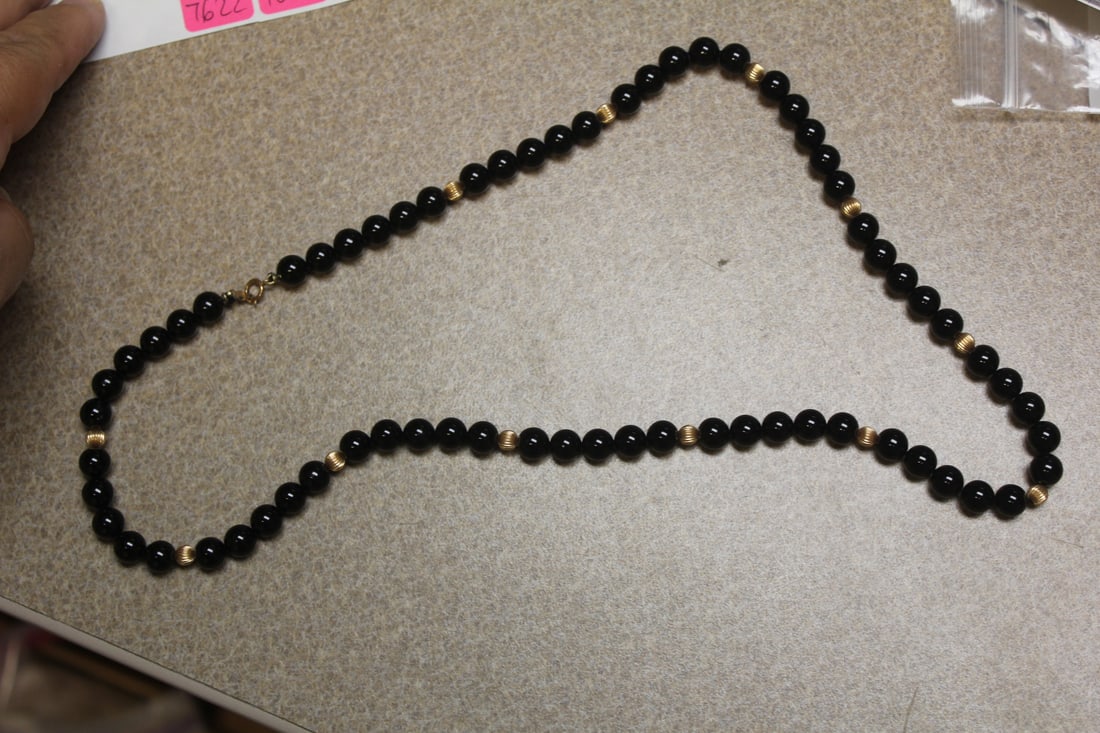 Onyx and Gold Necklace: marked 14K or 14 karat - 12 inches long when clapsed
