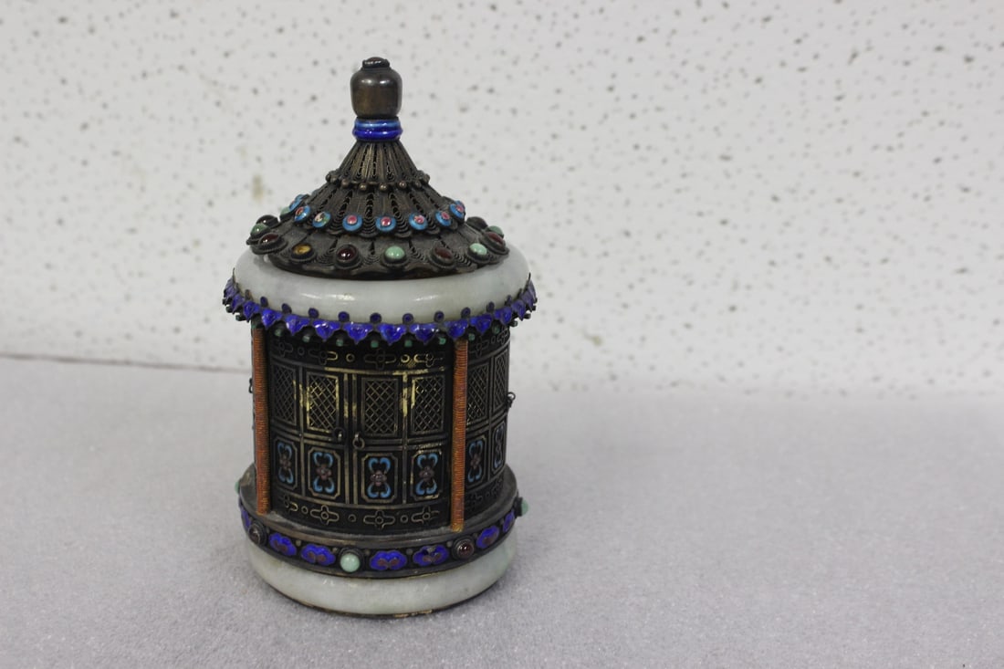 An Antique Chinese Silver and Jade Tea Caddy: 6 inches tall - please note" two stones are missing