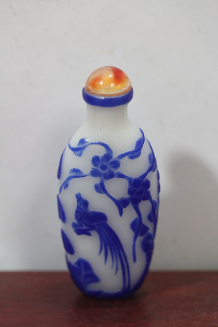A Chinese Carved Overlay Peking Glass Snuff Bottle: 3 1/4" tall