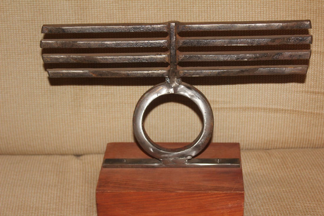 Signed Metal Sculpture on Wood: 11" across