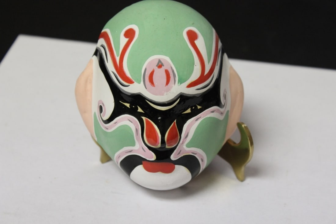 A Ceramic Decorative Mask: 4 1/2" long