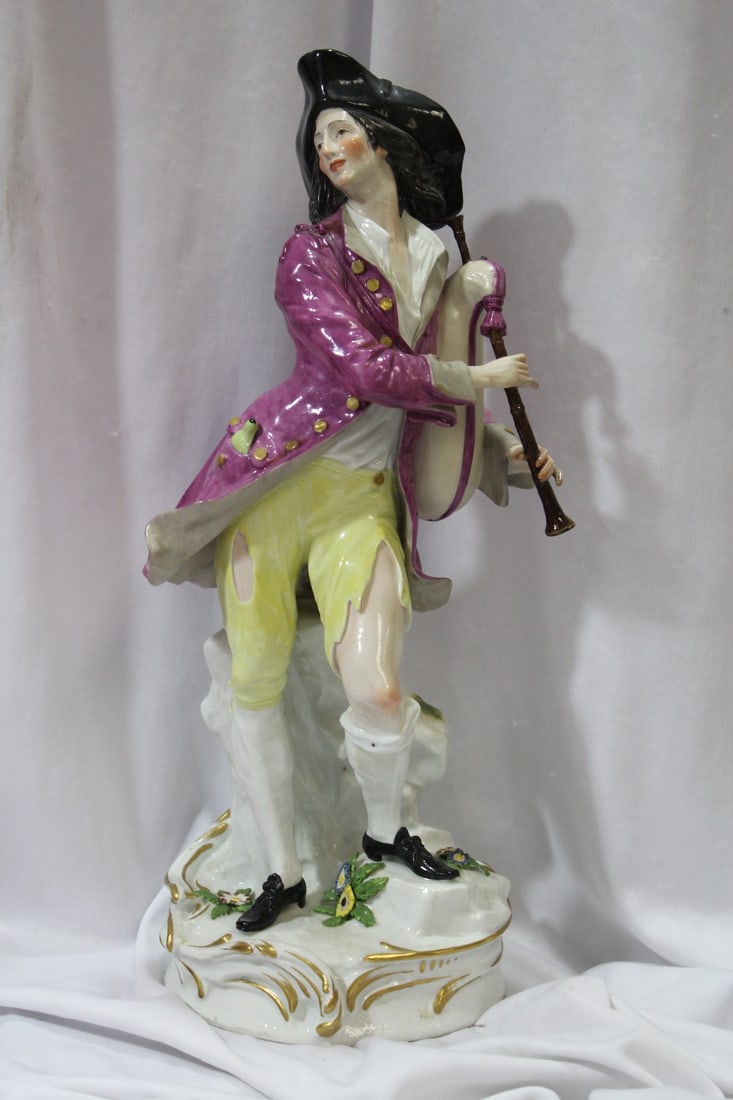 A German Meissen Porcelain Musician: please note: some manufacturer's imperfection as shown - 14 1/4" tall