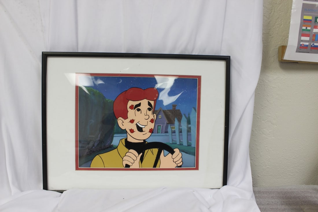 A Signed Cell from Archie: with COA on back - signed by Lou Schemer - overall= 16 1/2" x 12 1/4"