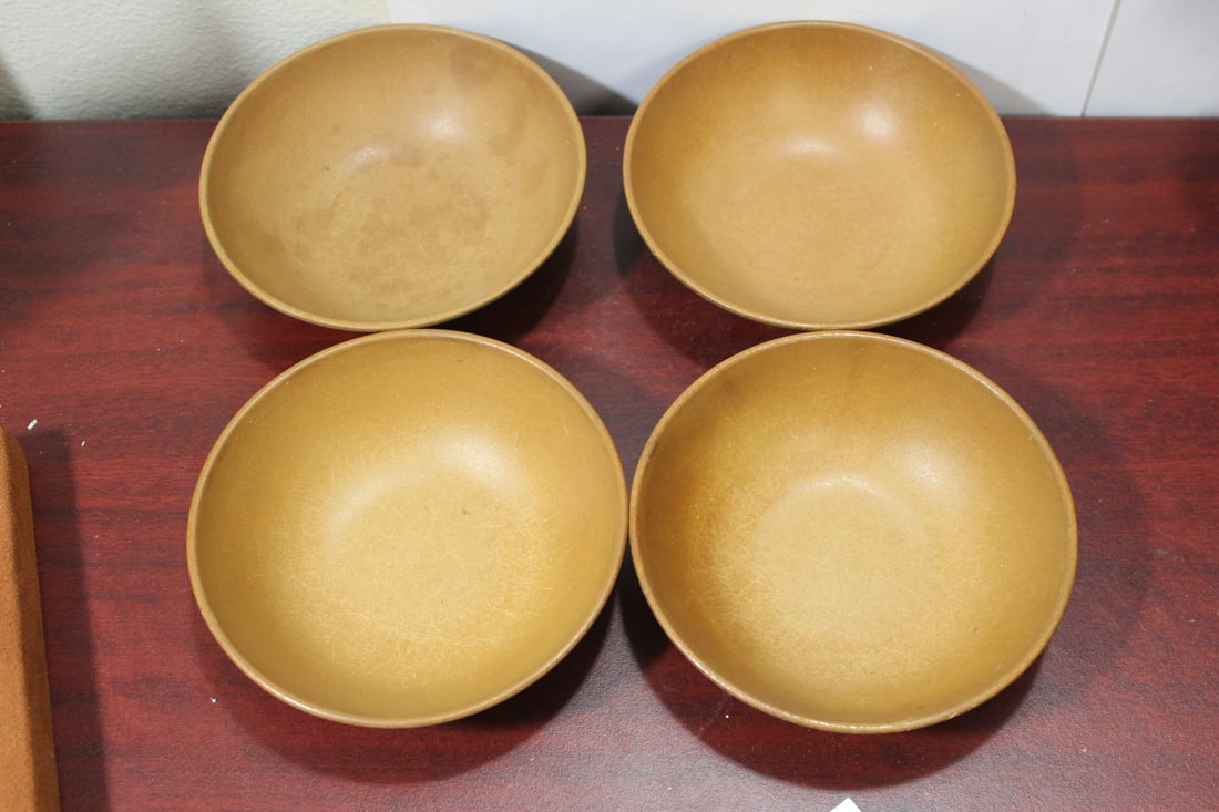 A Set of 4 Agatized Bowls: mid century-modern - wood look-a-like plastic - 5 3/4" in diameter
