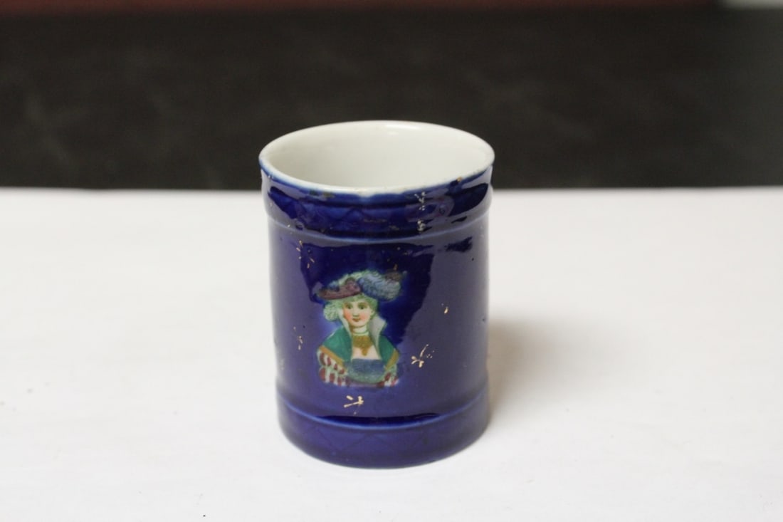 A Hand Painted Porcelain Figerual Cup: 2 1/2" tall - probably early 20th century