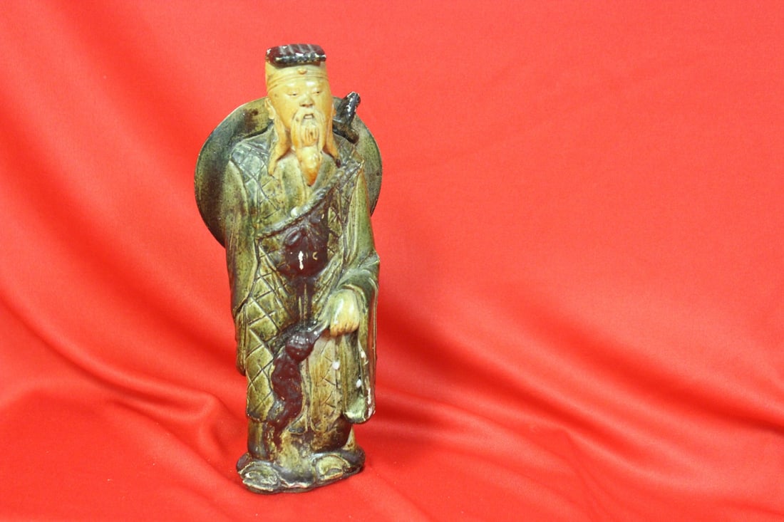 An Old Ceramic Chinese Figurine (1 of 4)