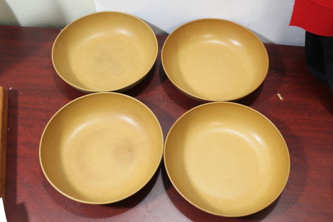 A Set of 4 Agatized Bowls: mid century-modern - wood look-a-like plastic - 7 1/8" in diameter