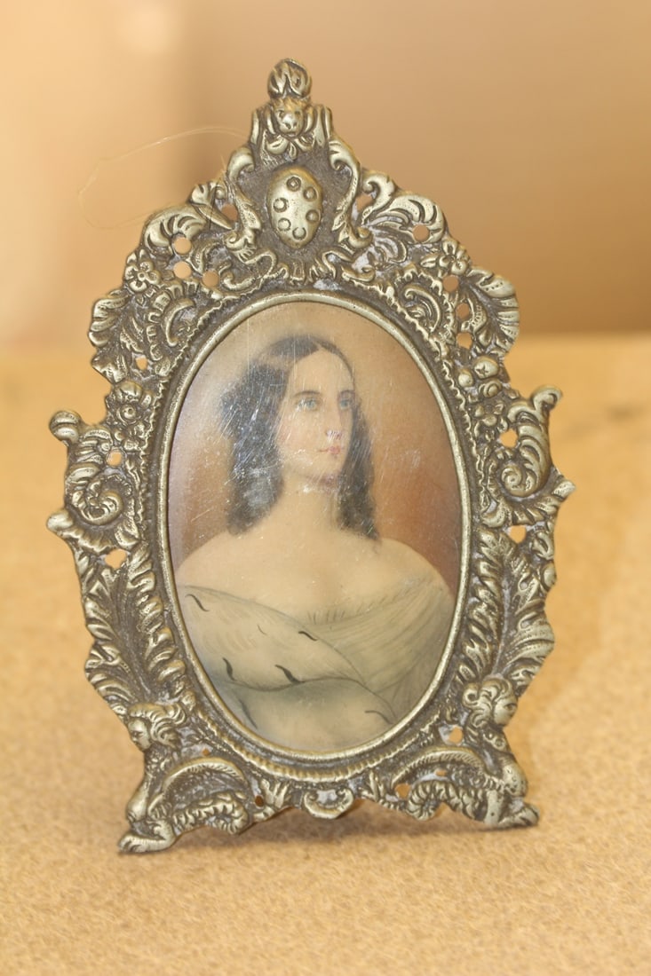 Hand Painted on Wood Portrait: inside an ornate brass frame - overall= 5 5/8" tall