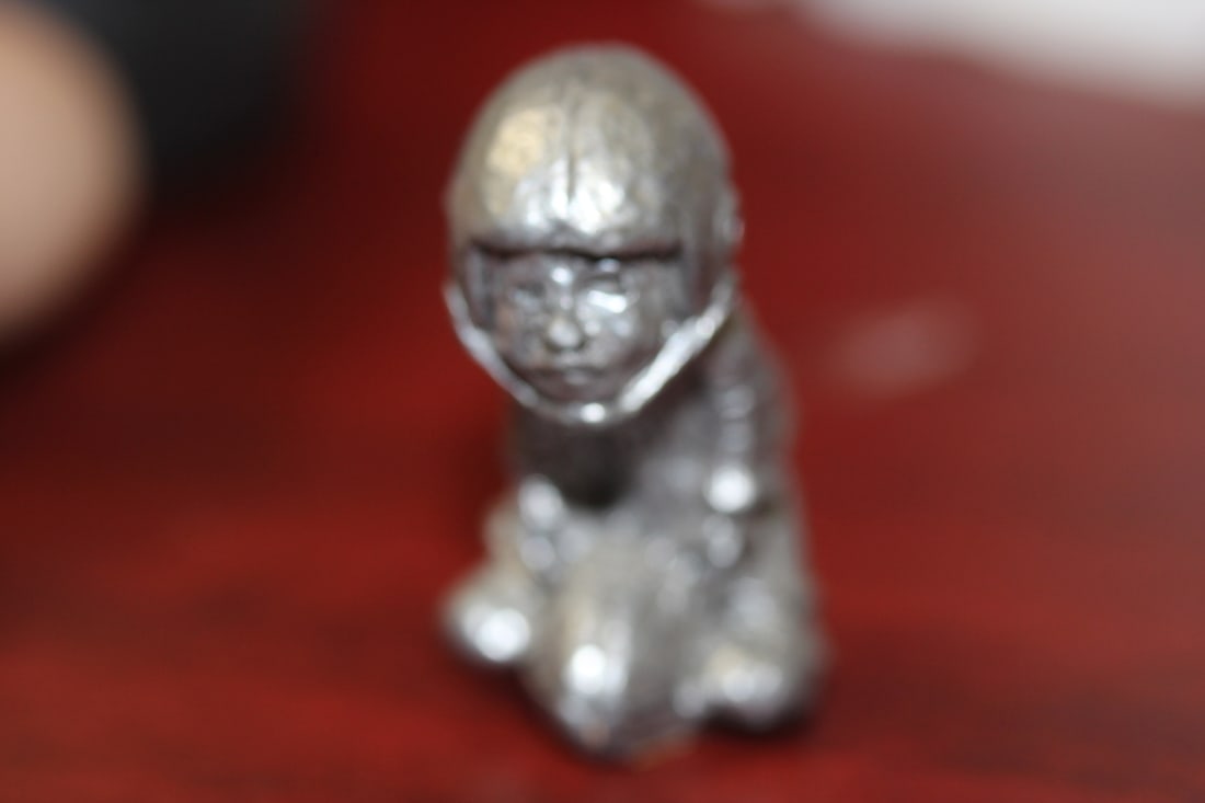 A Small Pewter Football Player: 1 7/8" tall