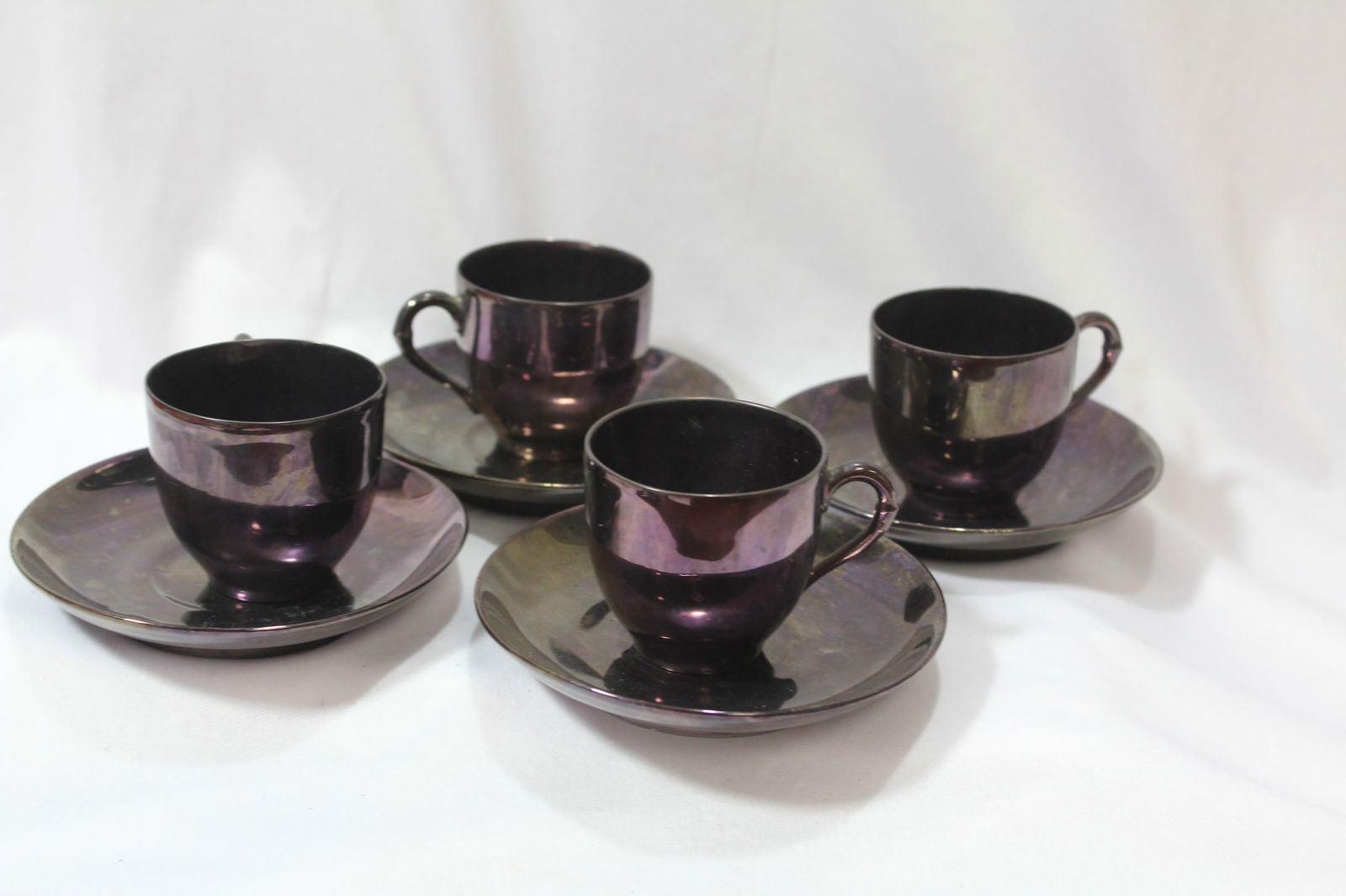 Set of 4 Dematesse Cup and Saucers: maker's mark on the bottom - saucer= 3 7/8" in diameter