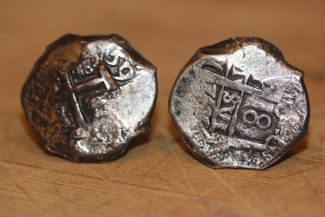 Possible Ship Wreck Coins Cufflink: coins turned into cufflinks - tested as high grade silver - right at one inch in length each - however, not authenticated