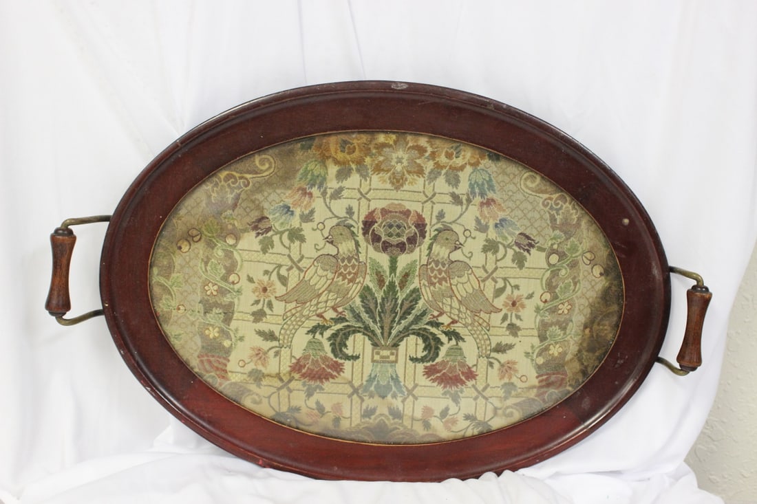 A Tray: 18" in diameter, not including the handles