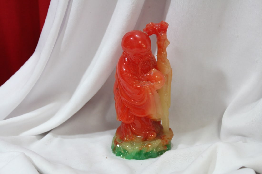 A Resin Buddha: 4 3/4" tall