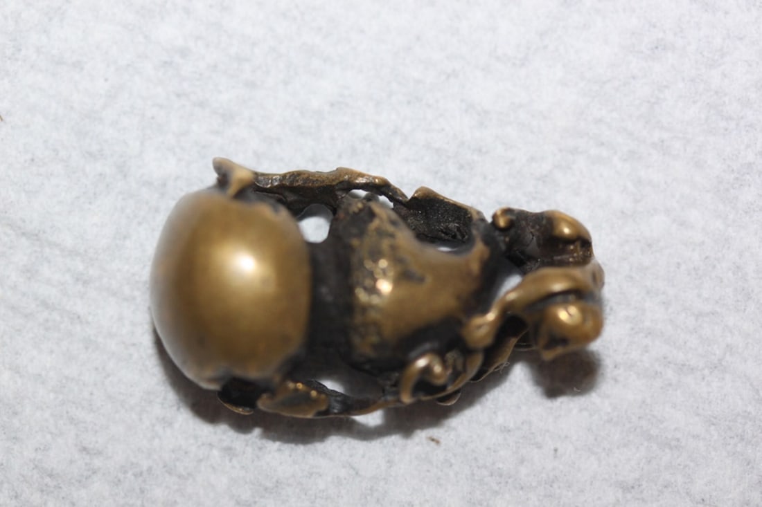 19th Century Japanese Bronze Netsuke: Depicts monkey on gourd. 1 1/4" tall. Most likely end of Edo period.