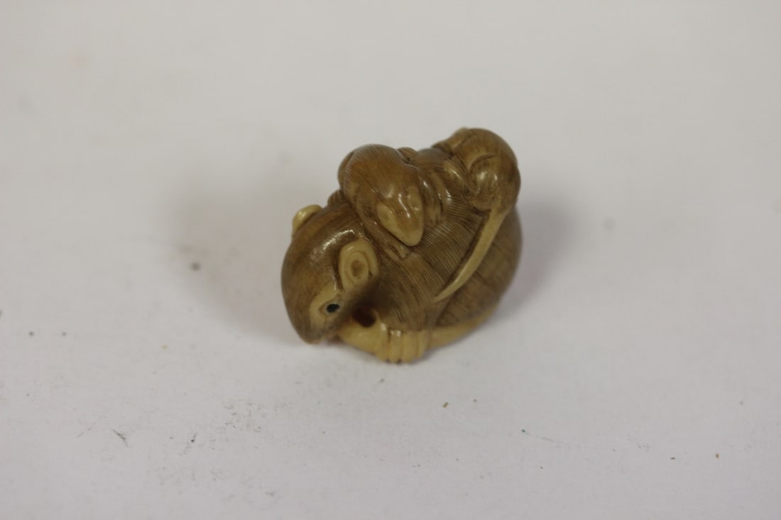A Finely Carved Japanese Tagua Nut Netsuke: 1 1/4" across