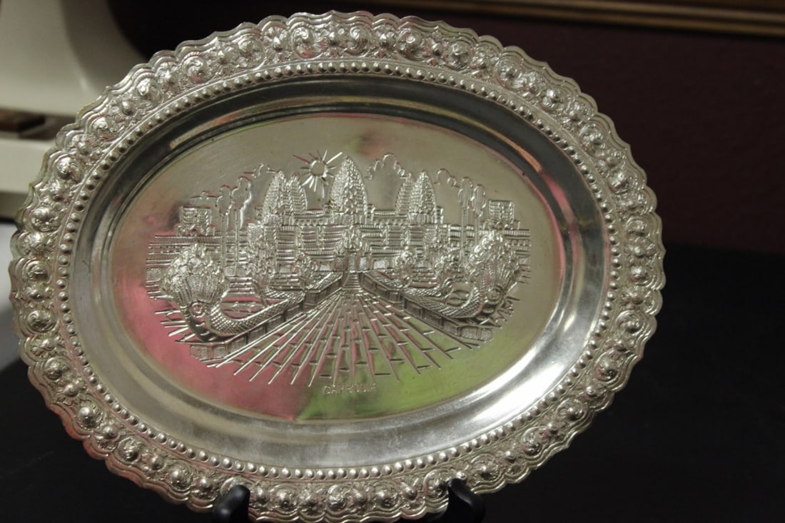 A Decorative Silverplate Wall Hanger: 11 inches in diameter