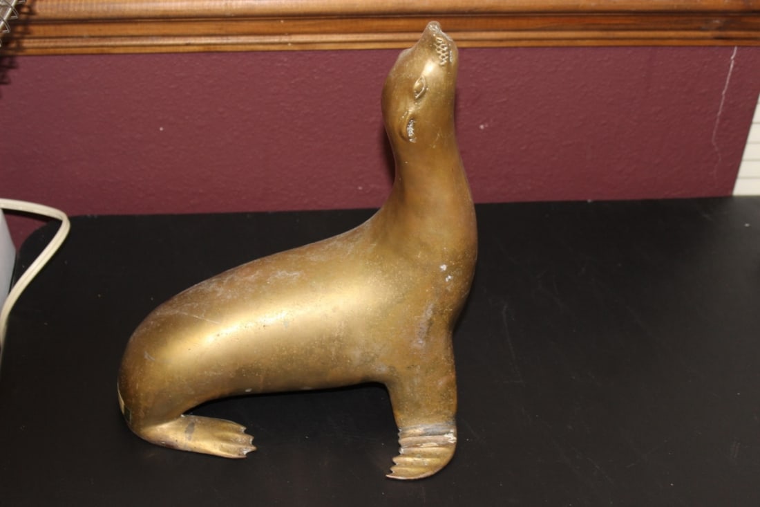 An Antique/Vintage Brass Seal: 12 inches tall x 10 inches wide