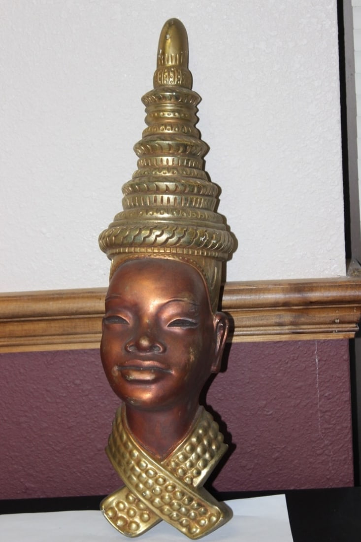 A Decorative Wall Hanger: 19 inches tall