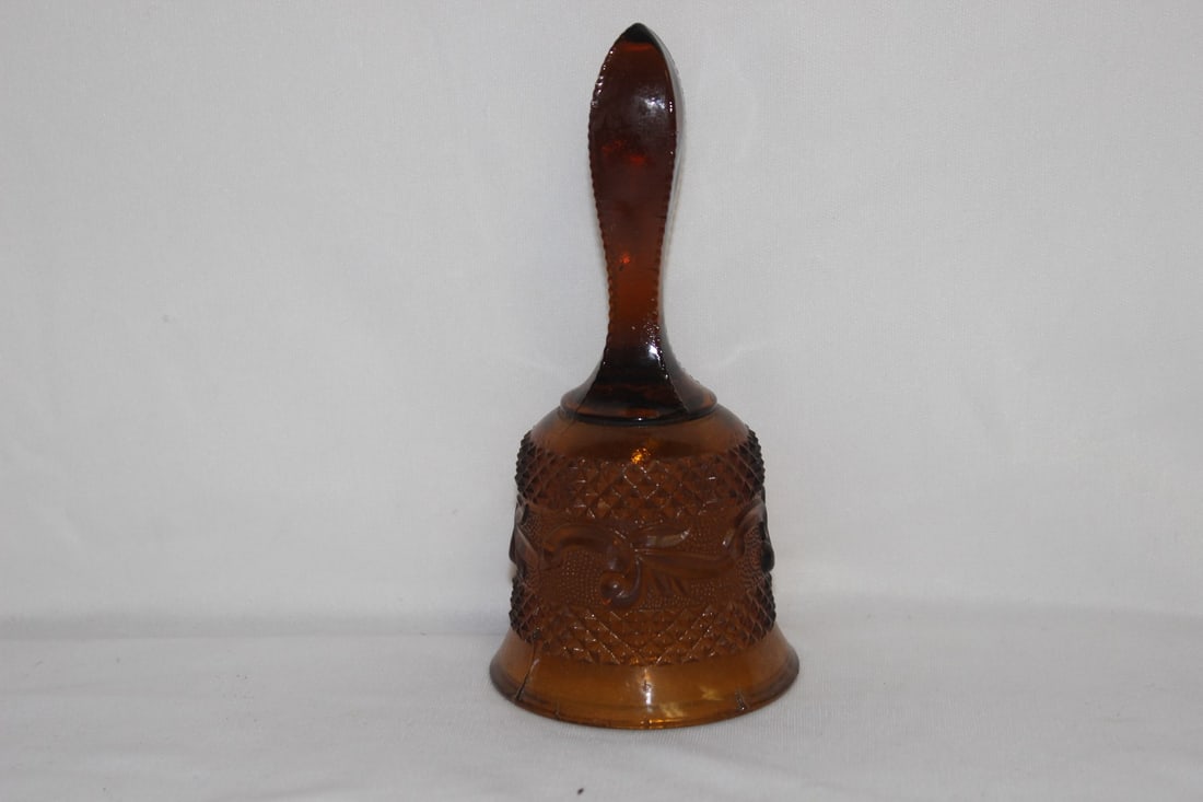 An Amber Glass Bell: no clasp - 6 1/4" tall