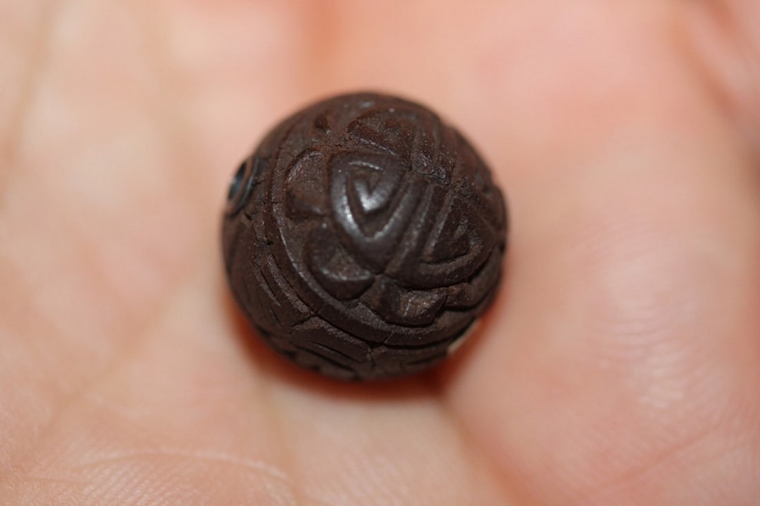 Antique Japanese Cinnabar Ojimie: 19th Century