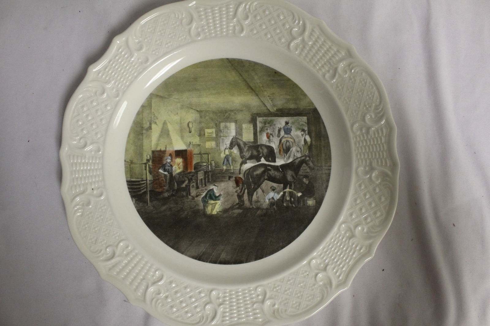 A Currie and Ives Ceramic Plate: 10 1/4" in diameter
