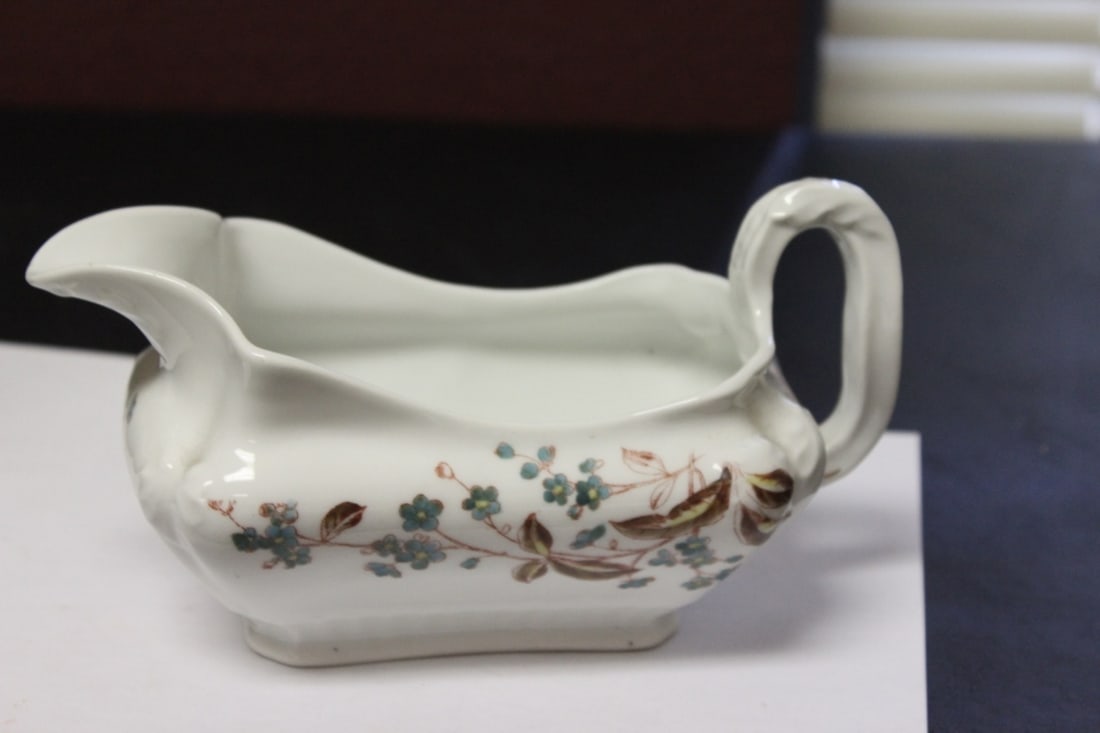 A Marked Antique Gravy Bowl: 8 inches long