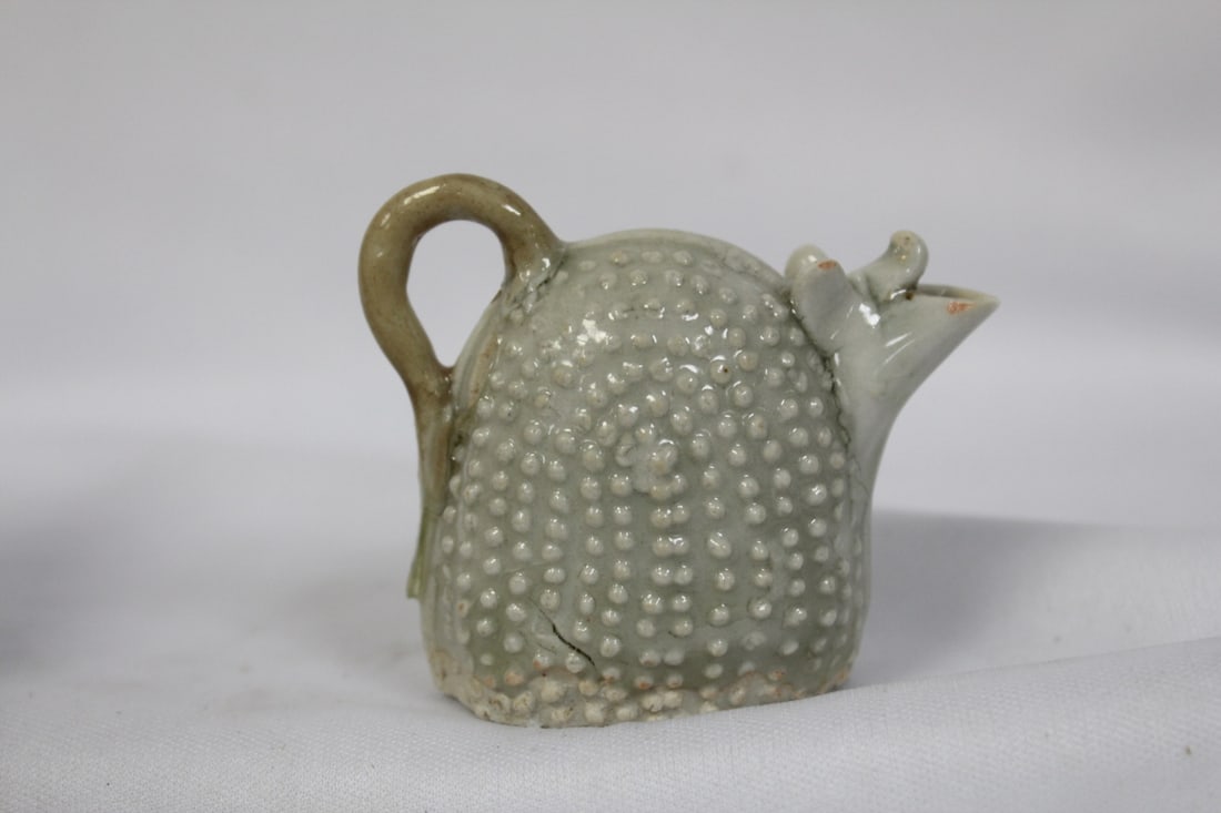 A Chinese Waterdropper: 18th / 19th century - 2 1/2" tall - please note: small chip on the spout