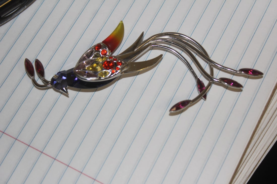 Large Swarovski Crystal and Sterling Brooch: Marked 925 sterling - paradise bird banamba brooch - please note: missing stone on one wing - 4 1/2" long