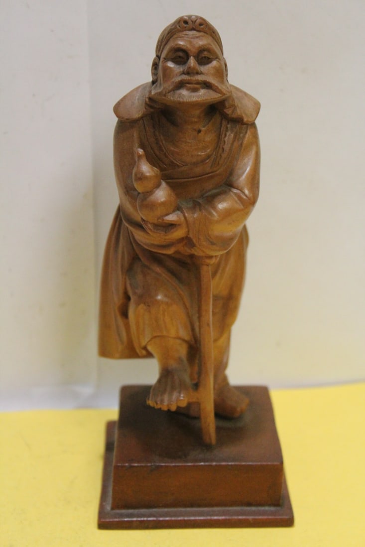 A Vintage Japanese Boxwood Figurine: on stand - overall= 7" tall