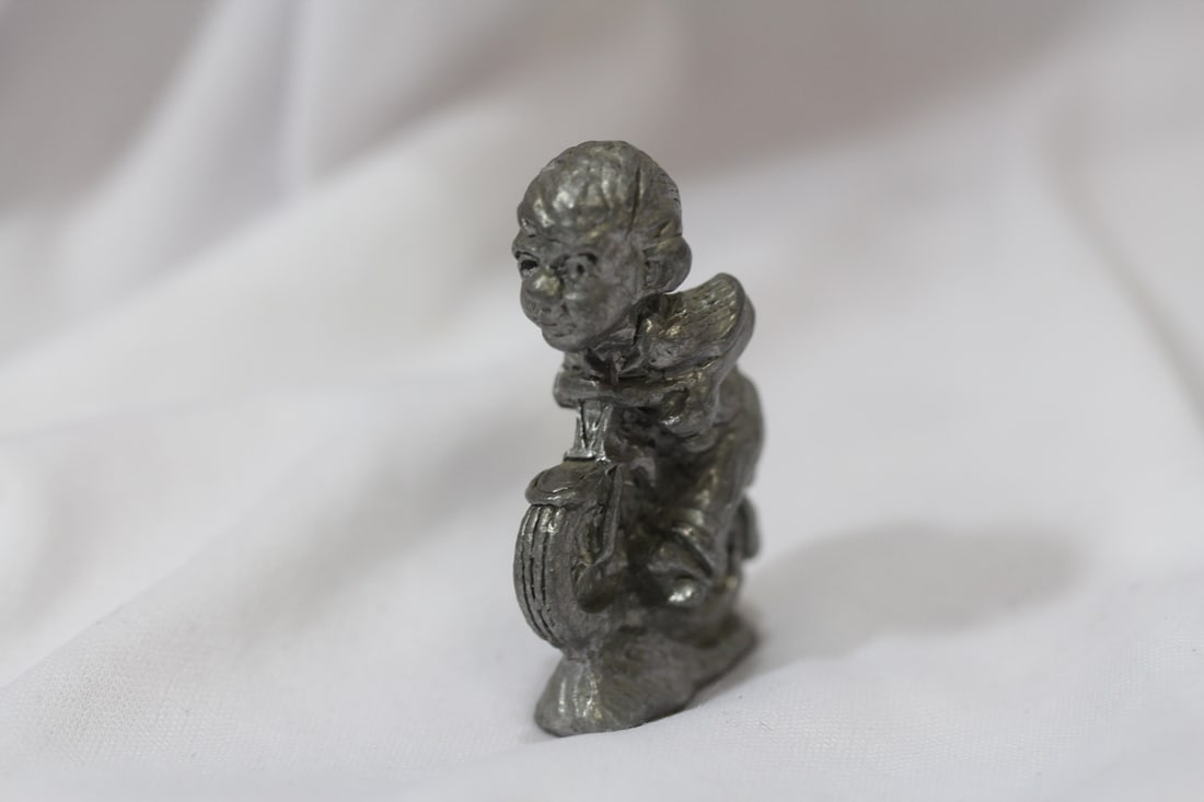 A Miniature Pewter Biker: 2 1/4" tall