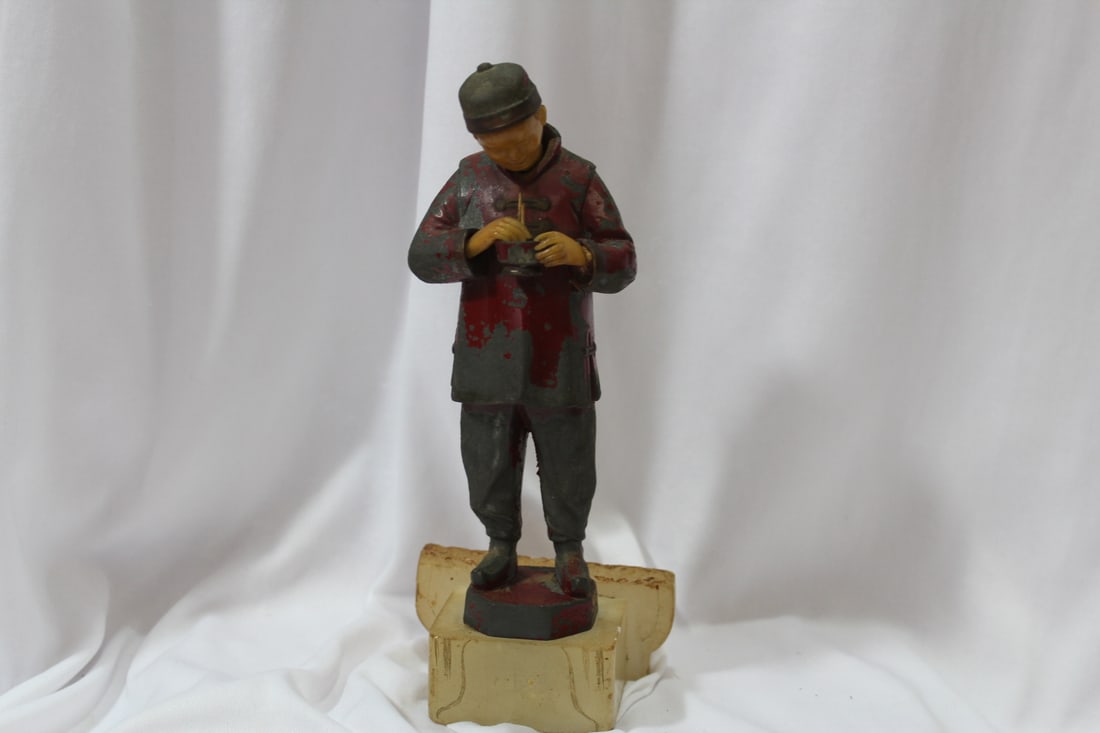 A Rare Oriental Boy with Bakelite Face: 8 3/4" tall - loss on the paint - metal - probably over 100 years old - Chinese boy appearred to be eating rice