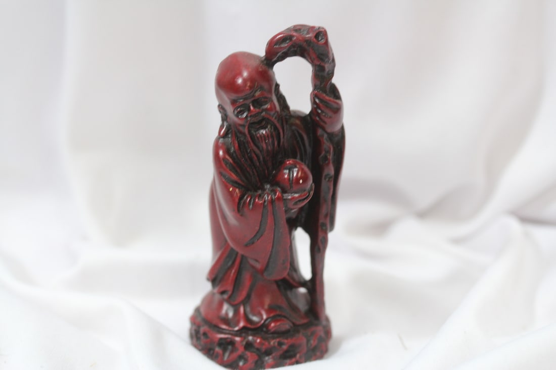 A Chiense Resin Figurine: nicely carved - 4" tall