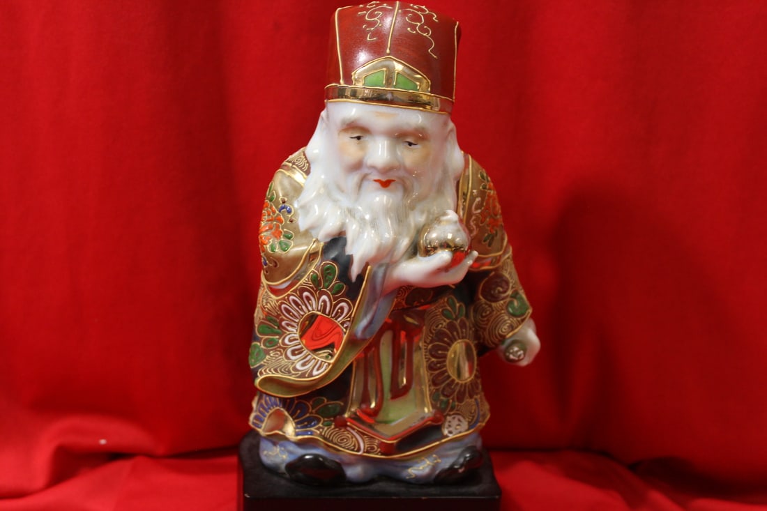 A Japanese Kutani Figurine: on stand - 10 1/2" tall - used to be mounted as a lamp