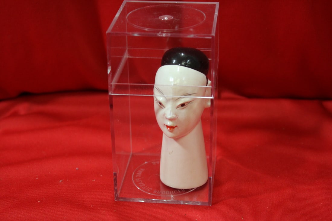 A Plastic Head: overall= 4 1/4" tall